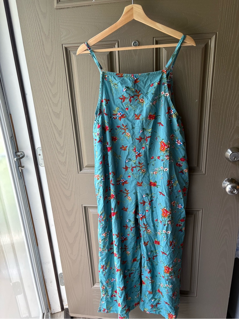 Teal Floral Romper Size Medium with Spaghetti Straps and pockets